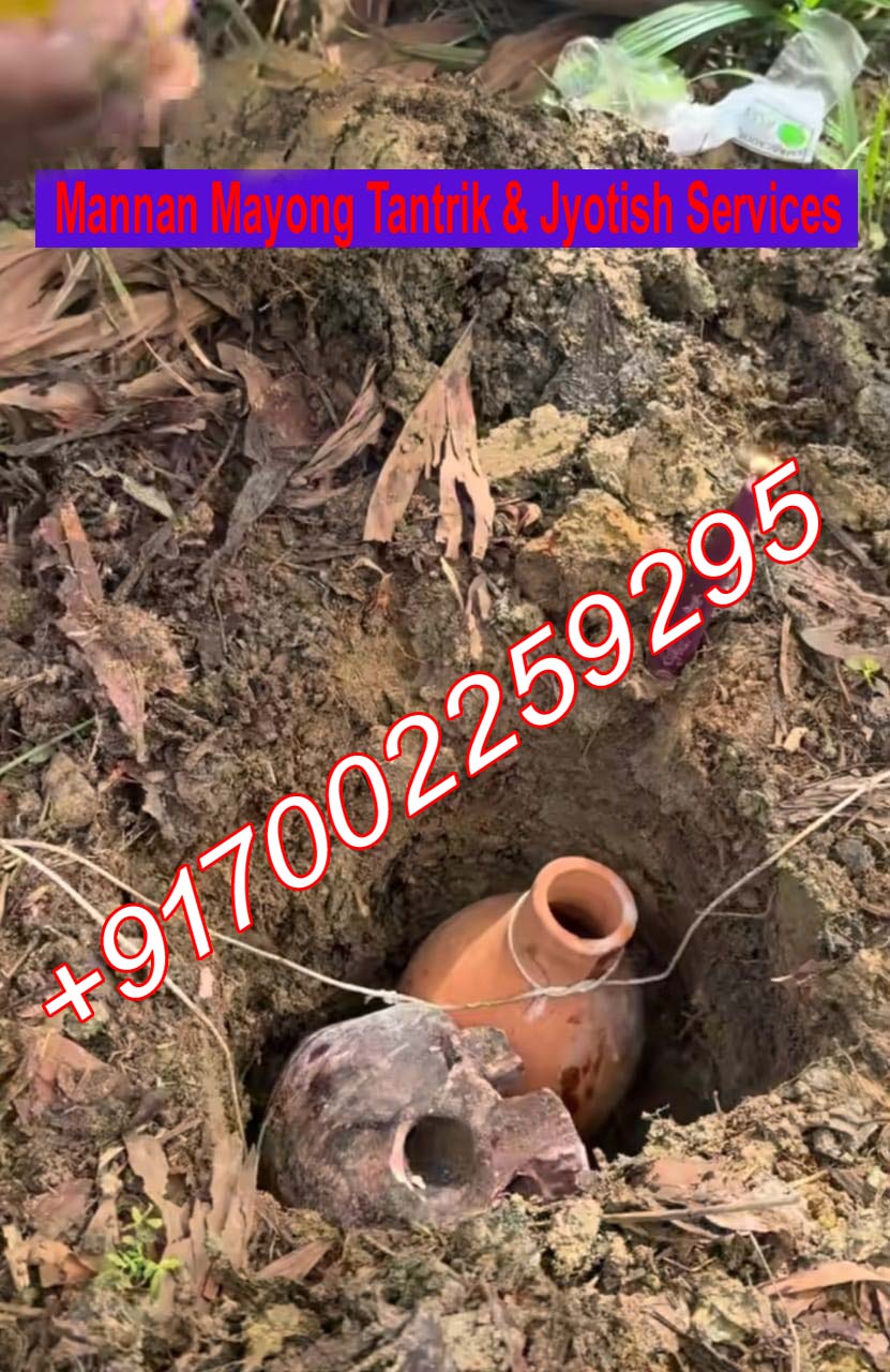 Earthen pot placed in the ground during a traditional observance by Mannan Tantrik