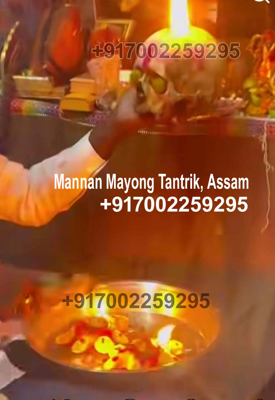 Lamps and offerings on an altar during a Mayong Tantrik observance