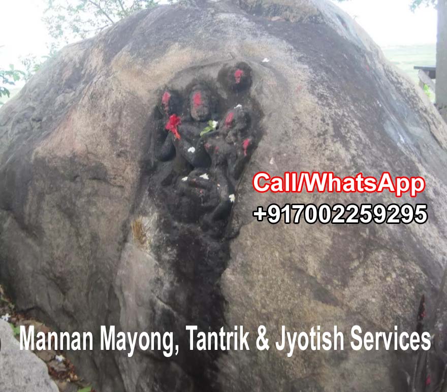 Ancient rock-carved shrine with sindoor offerings in Mayong, Assam